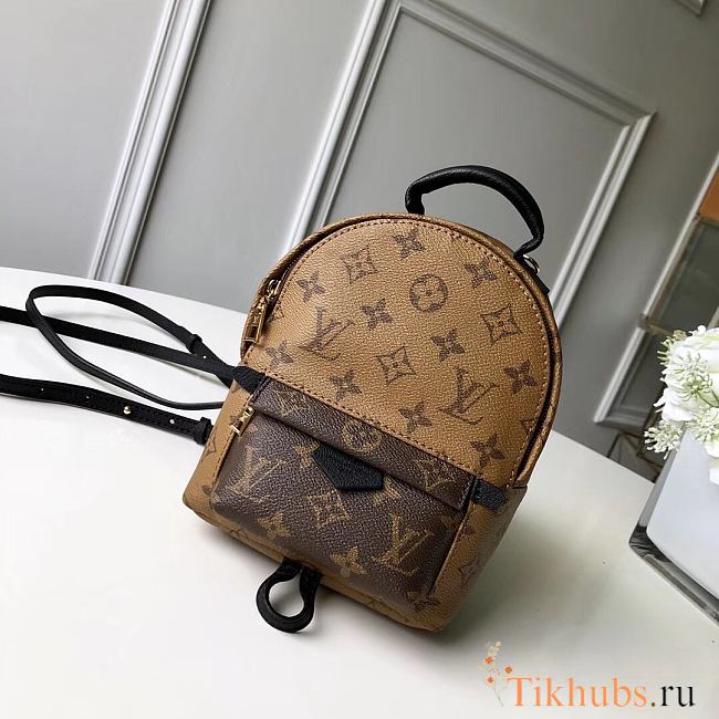 LV Mini Backpack Monogram M42411 Size 15 × 22 × 9 cm - 1