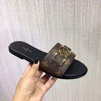 Louis Vuitton LV Lock IT Flat Mule 