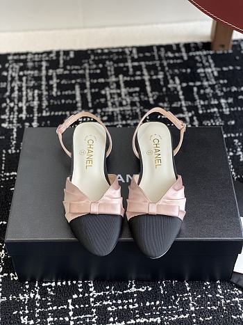 Chanel two-toned slingback pumps with a bow detail
