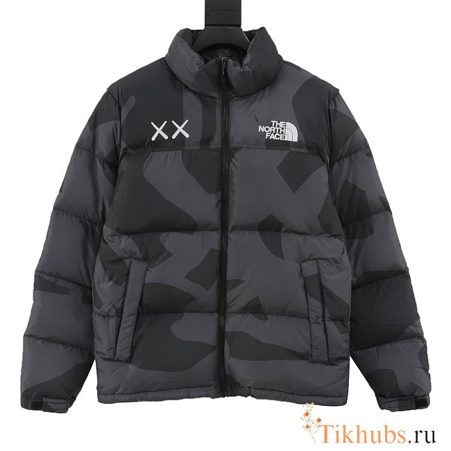 North Face x KAWS Retro 1996 Nuptse jacket in black.  - 1