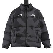 North Face x KAWS Retro 1996 Nuptse jacket in black.  - 1