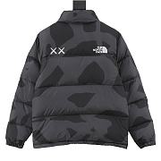 North Face x KAWS Retro 1996 Nuptse jacket in black.  - 5