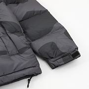North Face x KAWS Retro 1996 Nuptse jacket in black.  - 4