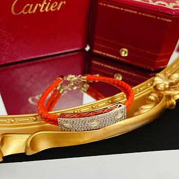  Cartier Love diamond-studded leather cord bracelet
