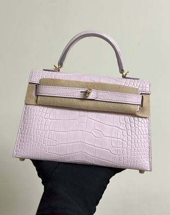  Hermès Mini Kelly from matte alligator leather in the color Mauve Pale