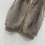 LP style brown fur vest with a ribbed knit turtleneck  - 3
