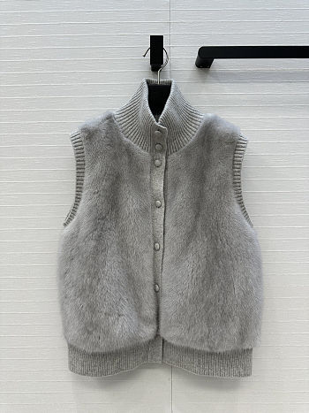 LP style gray fur vest with a ribbed knit turtleneck