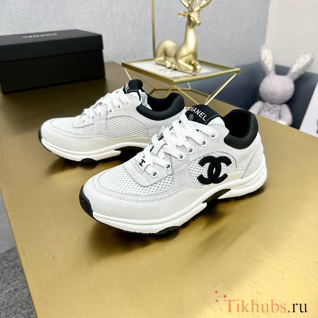 Chanel sneakers in a classic black and white - 1