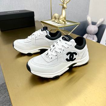 Chanel sneakers in a classic black and white