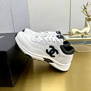 Chanel sneakers in a classic black and white - 6
