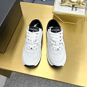 Chanel sneakers in a classic black and white - 5