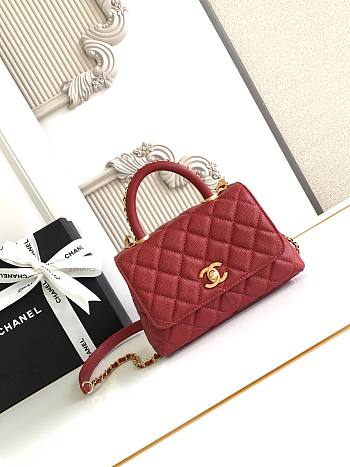 Chanel Coco Handle flap bag in red caviar leather with gold-tone hardware 19 cm