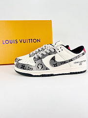 Nike SB Dunk Low x Louis Vuitton in white with black monogram fabric details - 1