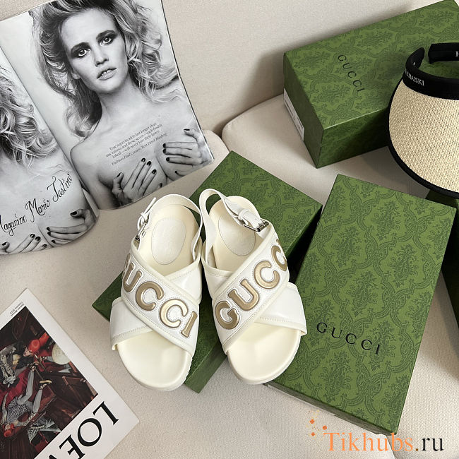 Gucci Logo-appliqué Leather Sandals in a cream/off-white color - 1