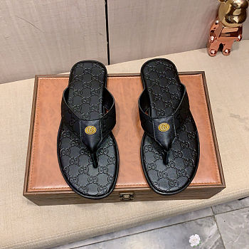 Gucci Interlocking G thong sandals in black