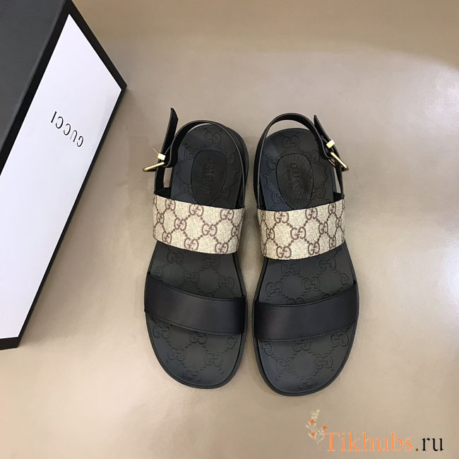 Gucci sandals with a black leather and GG canvas strap - 1