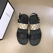 Gucci sandals with a black leather and GG canvas strap - 1