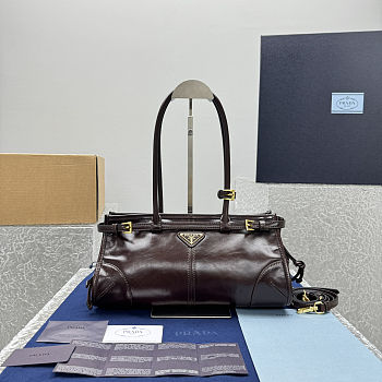 Prada Bonnie medium leather handbag in a burgundy color 32x15x13 cm