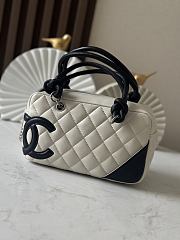 Chanel Mini Ligne Cambon Bowler bag in white lambskin leather with a black CC logo and handles 12*21*9cm - 1