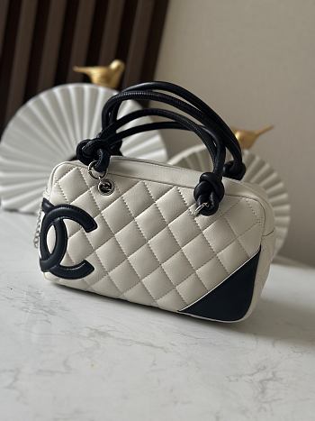 Chanel Mini Ligne Cambon Bowler bag in white lambskin leather with a black CC logo and handles 12*21*9cm