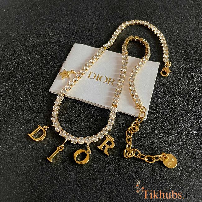 Dior evolution necklace in gold-finish metal and white crystals.  - 1