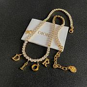 Dior evolution necklace in gold-finish metal and white crystals.  - 1