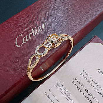 Panthère de Cartier bracelet in yellow gold with emeralds