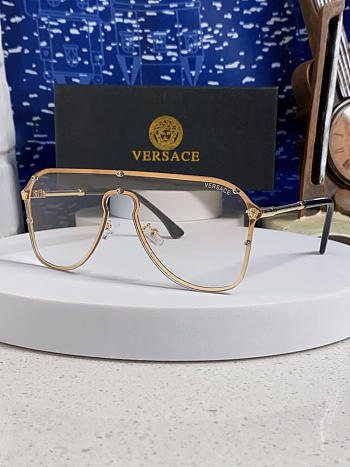 Versace pilot-style eyeglasses with a gold metal frame 