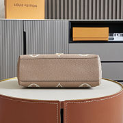 Louis Vuitton Madeleine MM bag in Bicolor Monogram Empreinte leather 30x19.5x11 cm - 4
