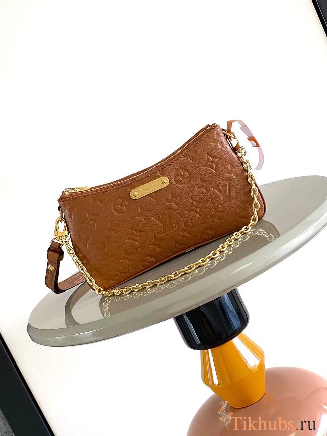 Louis Vuitton Liv Pochette in the cognac color 24.4*13.5*6.6cm - 1