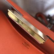 Hermès Constance 18 bag, featuring orange leather with gold hardware  - 4