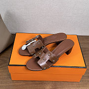 Hermes Oasis sandals in a brown leather with stud details - 1