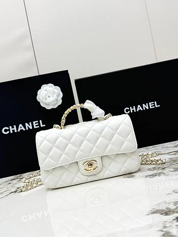 Chanel Mini Classic handbag in white has a handle embellished with rhinestones size 20x7x12 cm