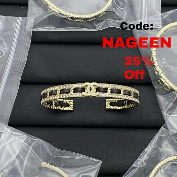 Chanel bracelet in black and gold-plated