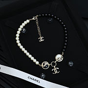 Chanel necklace is the A23C Pearl Coco Mark  - 3