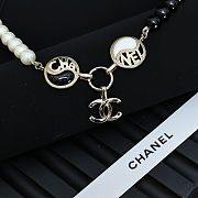 Chanel necklace is the A23C Pearl Coco Mark  - 4