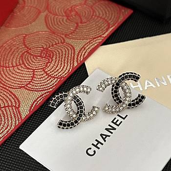 Chanel CC earrings are crafted with black and clear crystals