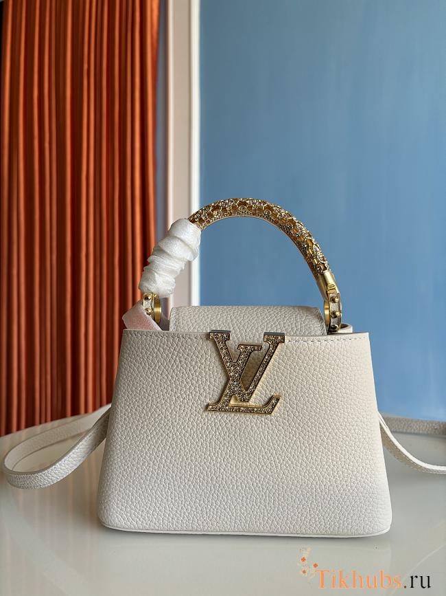 Louis Vuitton Capucines mini handbag in powder beige with crystal-embellished logo 13.6x8x21 cm. - 1