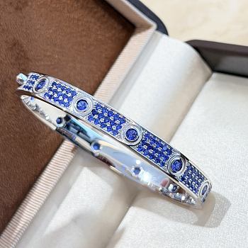 Cartier Love bracelet, classic model, paved with blue sapphires and diamonds